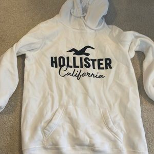 HOLLISTER WHITE HOODIE. size small with navy logo. great condition!